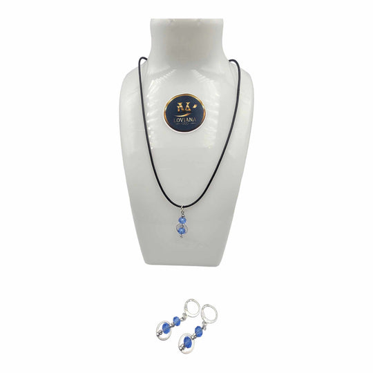 Ensemble collier et boucles d'oreilles cristal